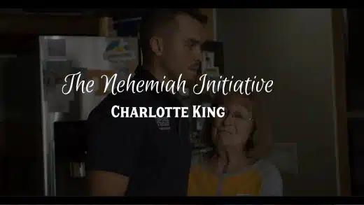 Kelton and an older woman stand together in a kitchen. Text overlay reads
