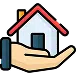 A hand holding a small house with a red roof, representing home ownership or real estate.