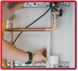 person running piping for a tankless water heater