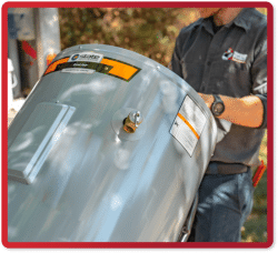 man installing a water heater