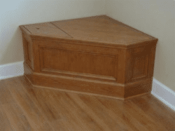 Bench hiding a sump pump