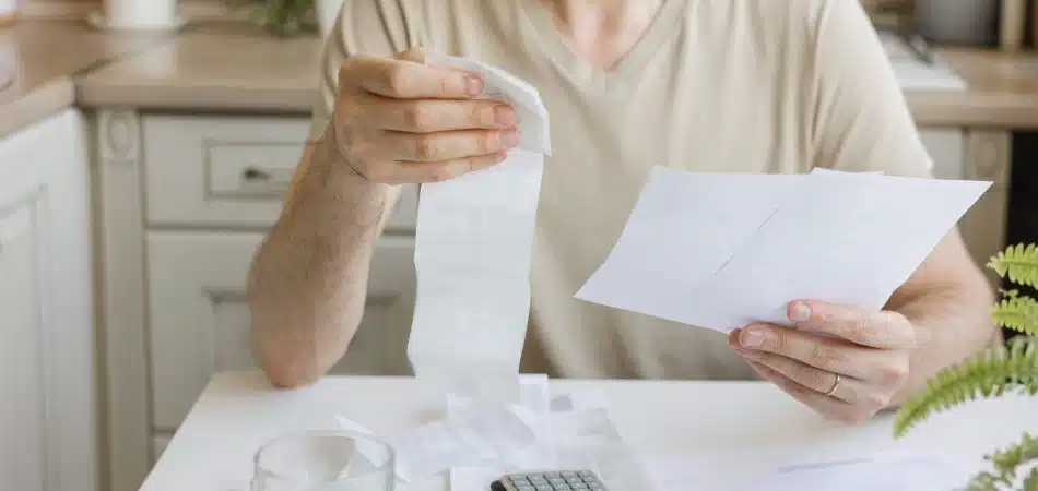 man wondering his spike in water bill