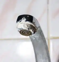 Mineral-stained faucet.
