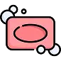 Icon of a pink bar of soap with bubbles around it, representing soap that struggles to lather due to hard water.